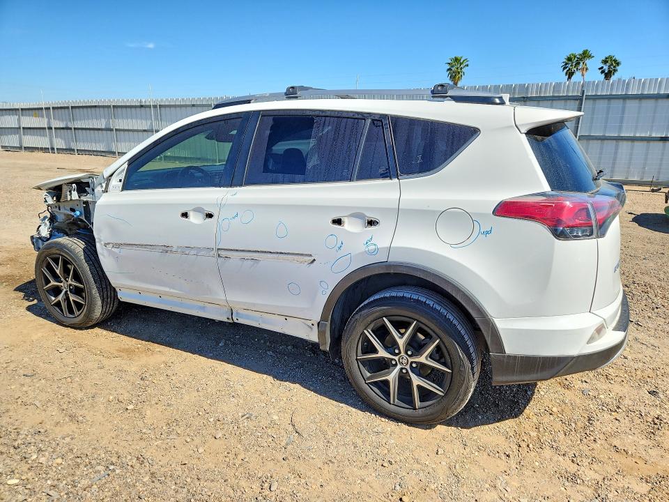 Photo 2 from auction – 2018 TOYOTA RAV4 with VIN JTMNFREV8JJ209396