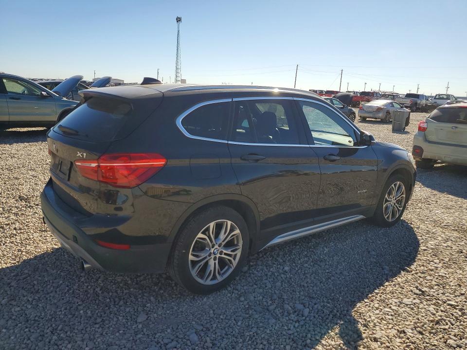 Photo 3 from auction – 2016 BMW X1 with VIN WBXHT3Z35G4A48398