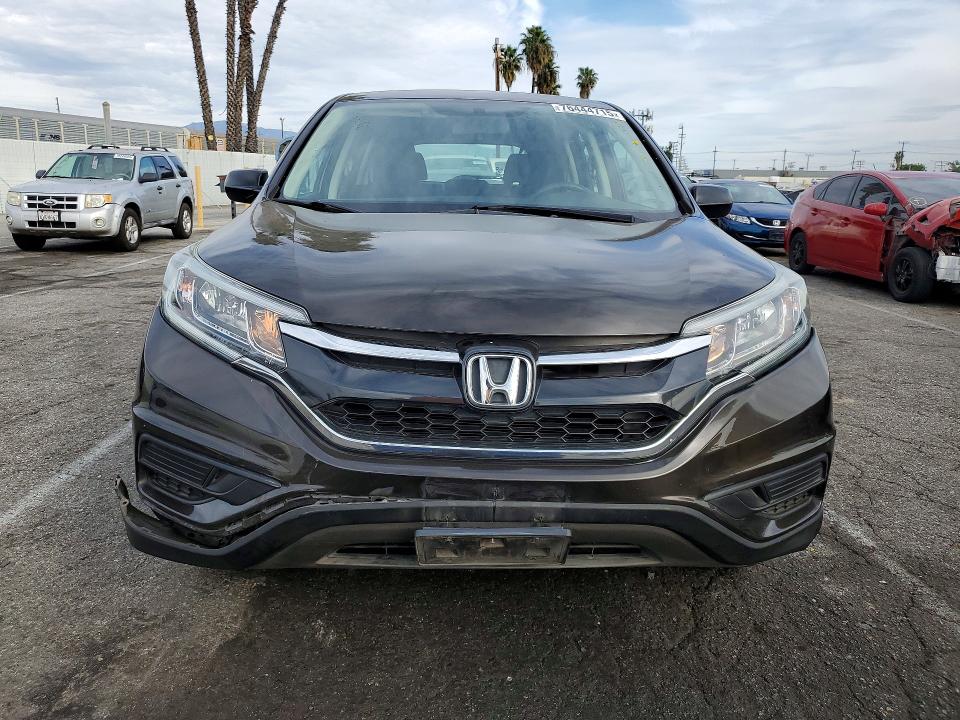 Photo 5 from auction – 2015 HONDA CR-V LX with VIN 2HKRM3H33FH547142