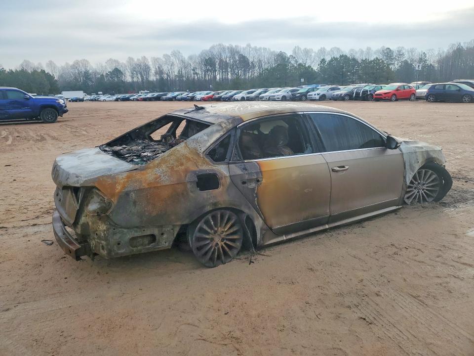 Photo 3 from auction – 2016 VOLKSWAGEN PASSAT with VIN 1VWBS7A34GC009939