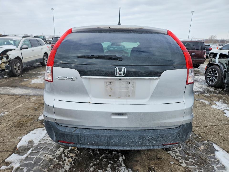Photo 6 from auction – 2012 HONDA CR-V with VIN 3CZRM3H58CG701554