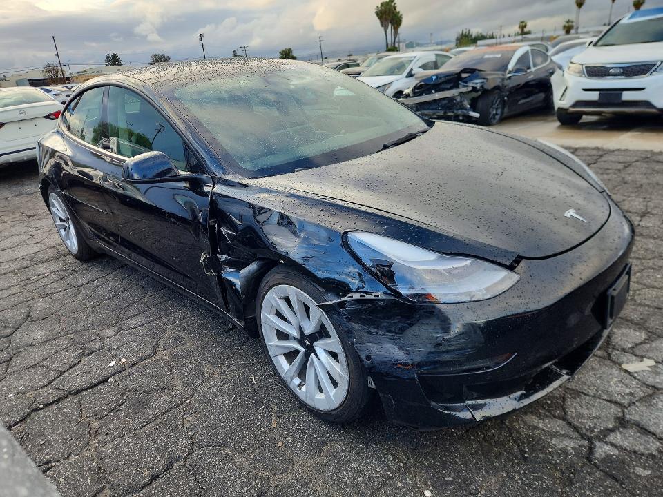 Photo 4 from auction – 2022 TESLA MODEL 3 with VIN 5YJ3E1EA8NF288896