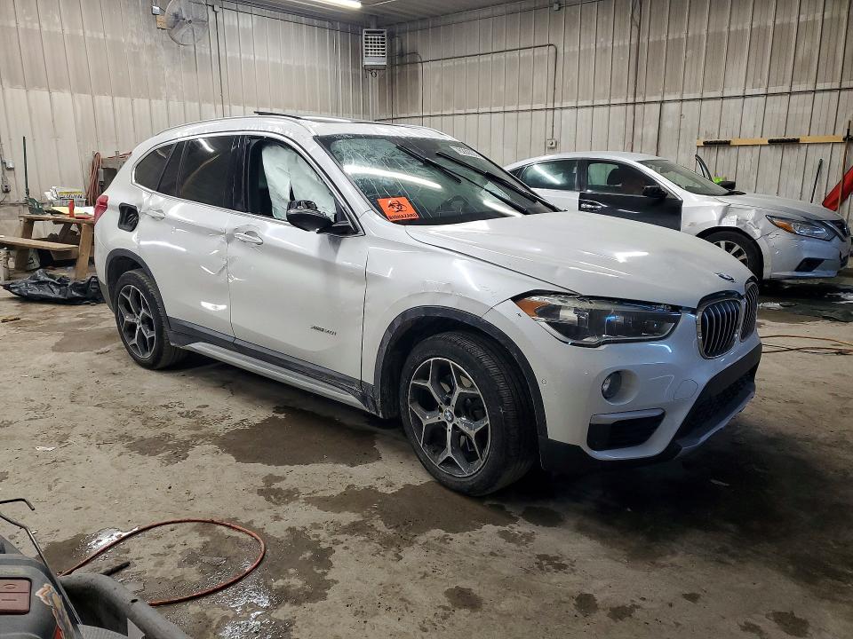 Photo 4 from auction – 2016 BMW X1 XDRIVE2 with VIN WBXHT3C31G5E47506