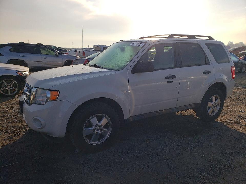 FORD ESCAPE XLT 2011 with VIN 1FMCU0D7XBKC63690 - Photo from auction