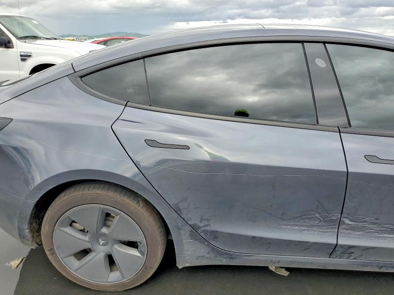 Photo 10 from auction – 2023 TESLA MODEL 3 with VIN 5YJ3E1EA1PF682632