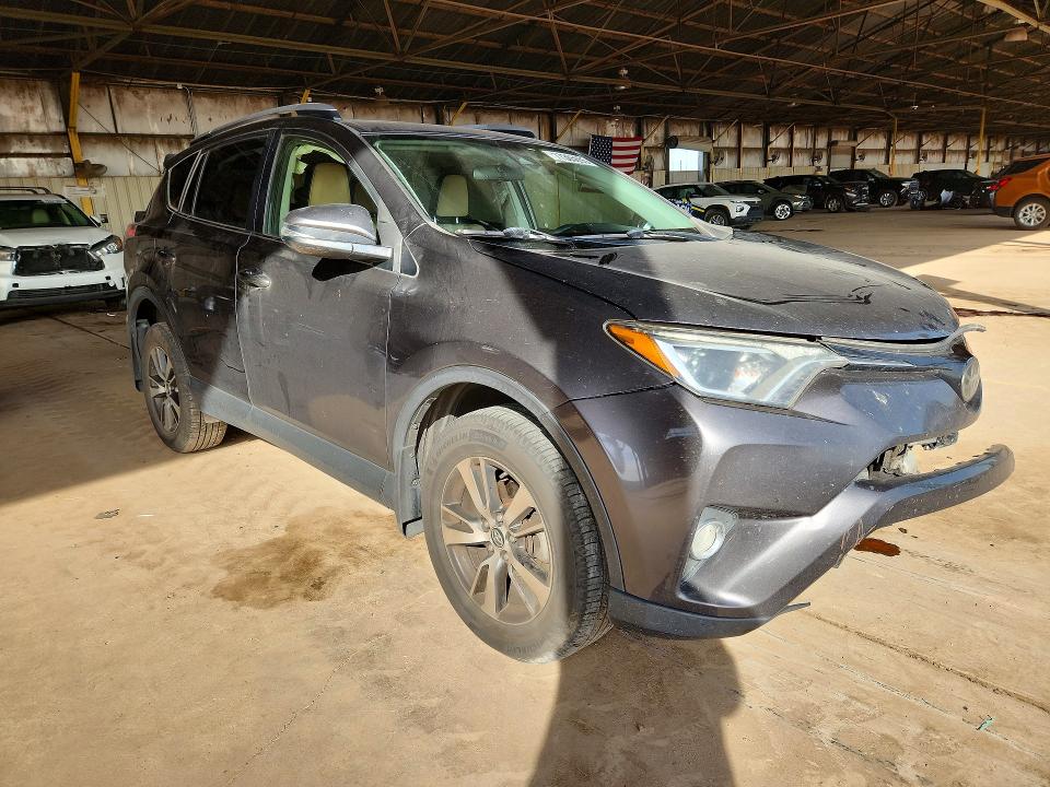 Photo 4 from auction – 2018 TOYOTA RAV4 with VIN JTMWFREV7JJ728900