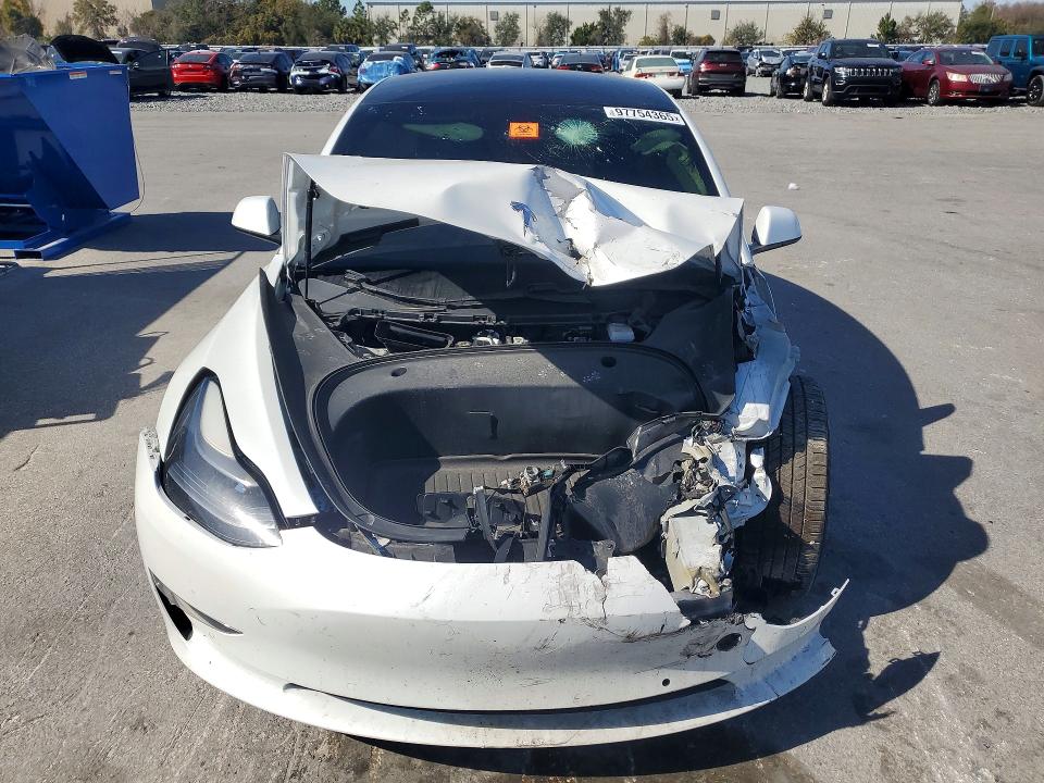 Photo 5 from auction – 2021 TESLA MODEL 3 with VIN 5YJ3E1EB0MF034123