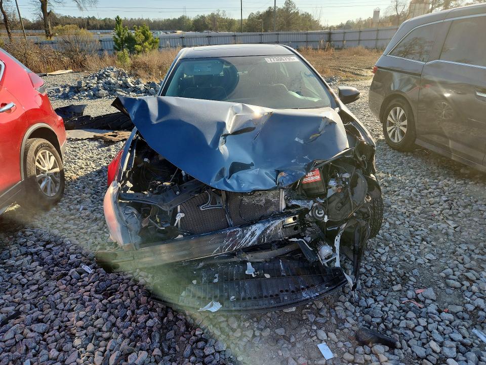 Photo 5 from auction – 2014 TOYOTA COROLLA with VIN 2T1BURHEXEC134139