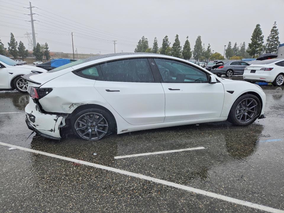 Photo 3 from auction – 2023 TESLA MODEL 3 with VIN 5YJ3E1EAXPF711142
