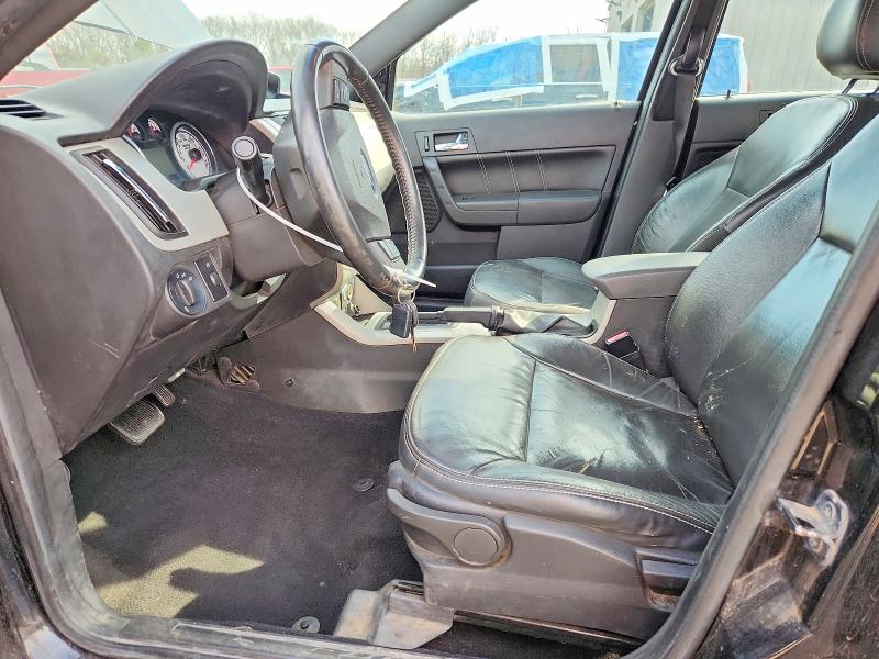 Photo 7 from auction – 2011 FORD FOCUS SES with VIN 1FAHP3GN3BW113920