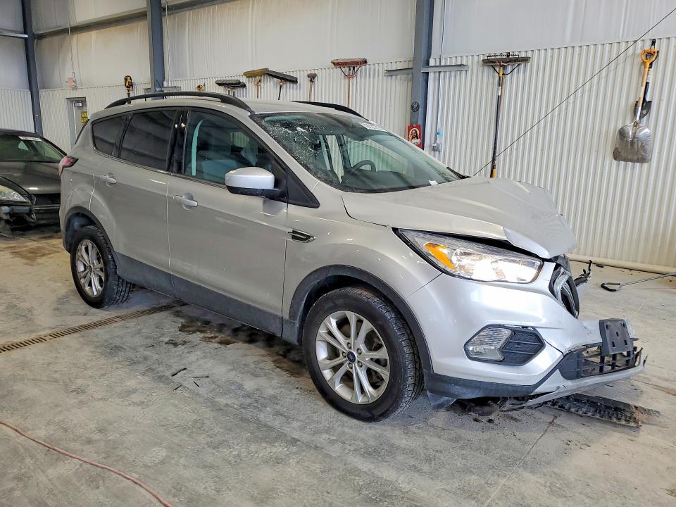 Photo 4 from auction – 2018 FORD ESCAPE with VIN 1FMCU9GD8JUD59813