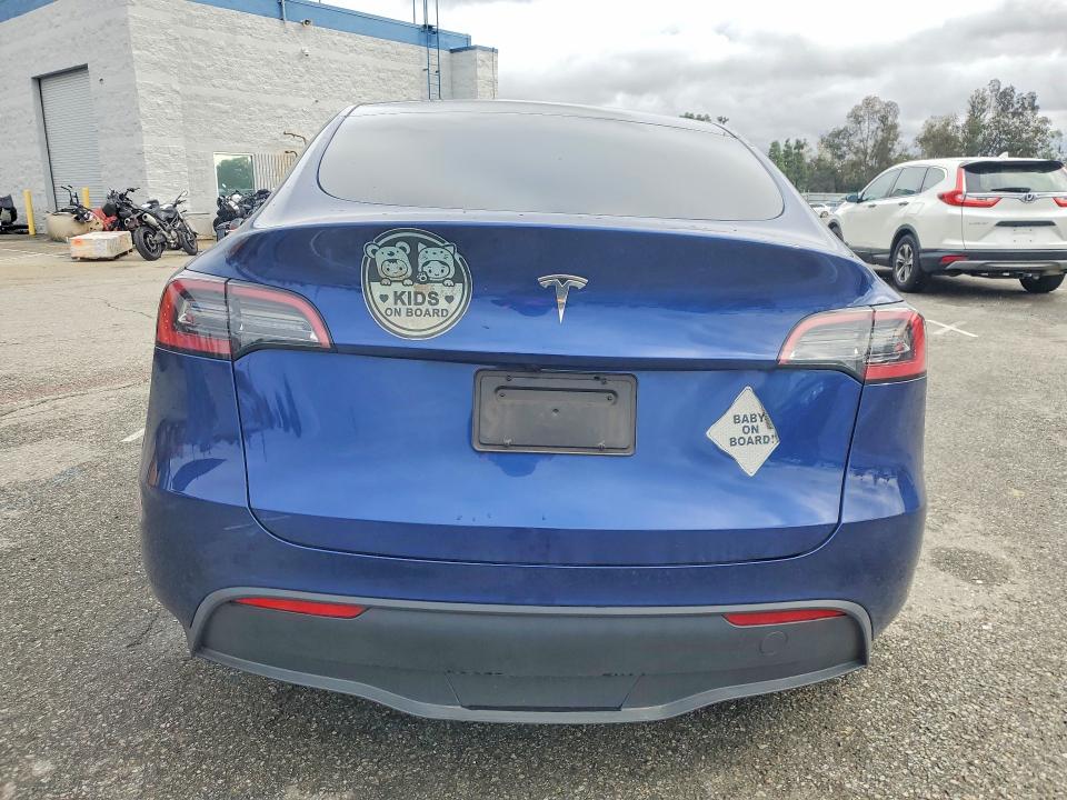 Photo 6 from auction – 2023 TESLA MODEL Y with VIN 7SAYGDED9PF946016