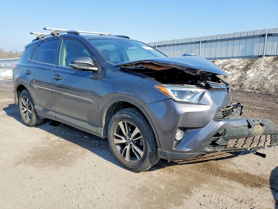 Photo 4 from auction – 2017 TOYOTA RAV4 XLE with VIN JTMRFREV0HJ113712