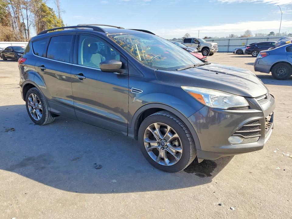 Photo 4 from auction – 2016 FORD ESCAPE with VIN 1FMCU9G96GUA90358