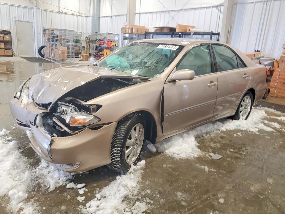 TOYOTA CAMRY LE 2003 with VIN 4T1BE30K03U250036 - Photo from auction