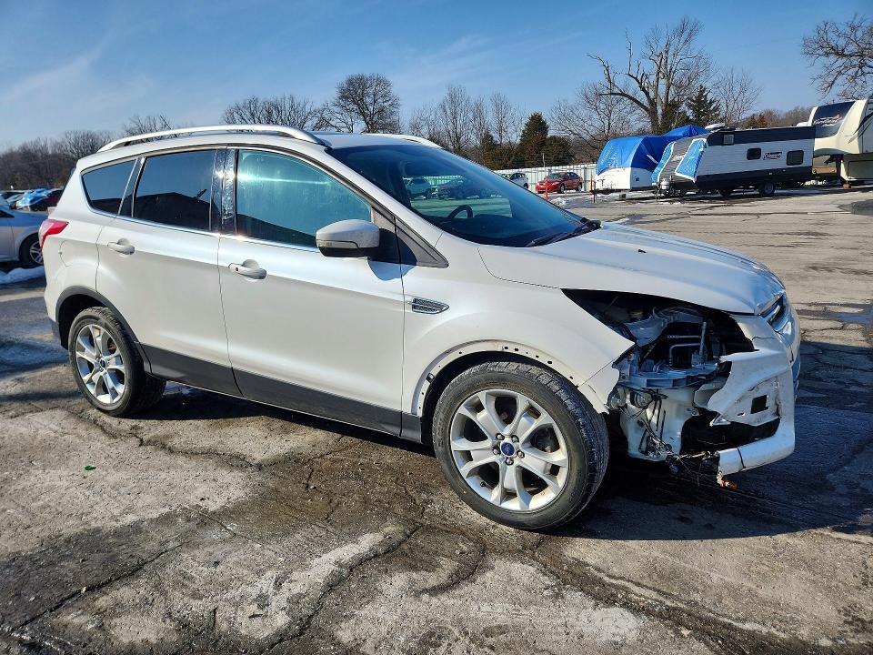 Photo 4 from auction – 2015 FORD ESCAPE TIT with VIN 1FMCU0J95FUB28262