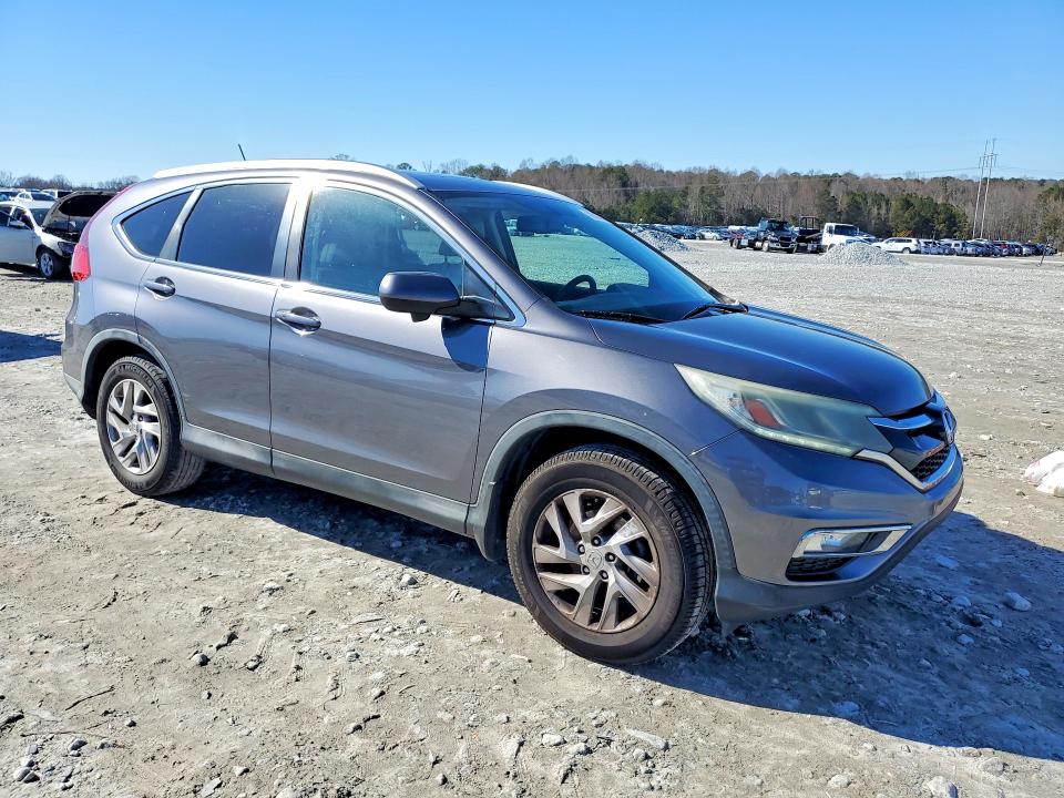 Photo 4 from auction – 2015 HONDA CR-V EXL with VIN 2HKRM3H79FH501351