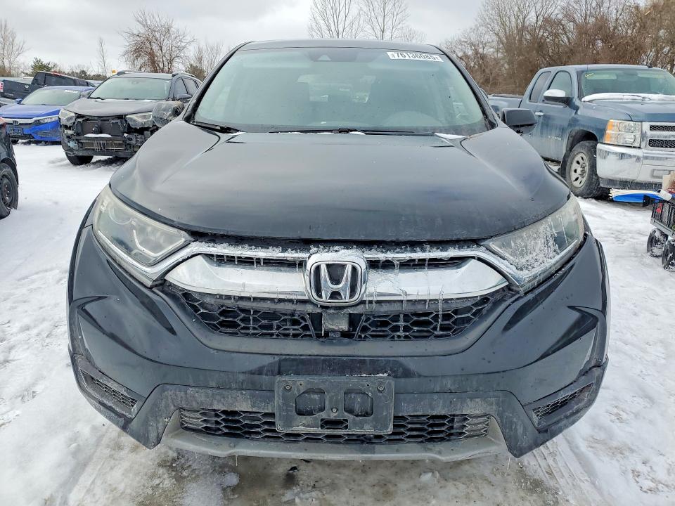 Photo 5 from auction – 2017 HONDA CR-V with VIN 2HKRW2H28HH110431