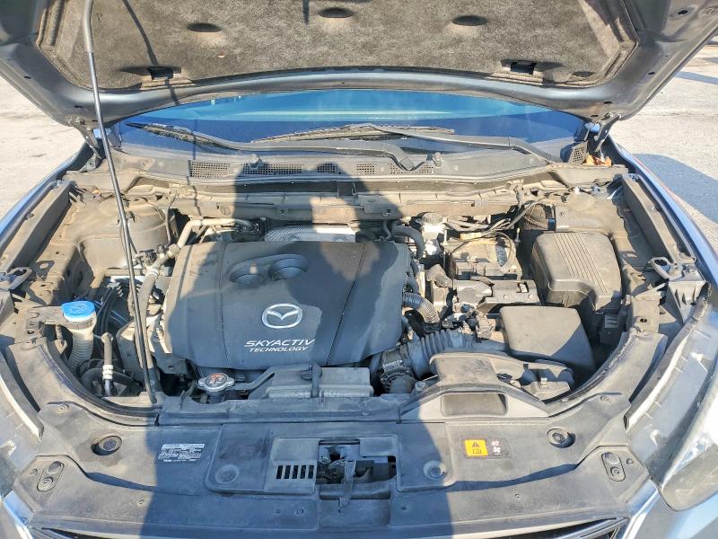 Photo 11 from auction – 2016 MAZDA CX-5 with VIN JM3KE2BY3G0877530
