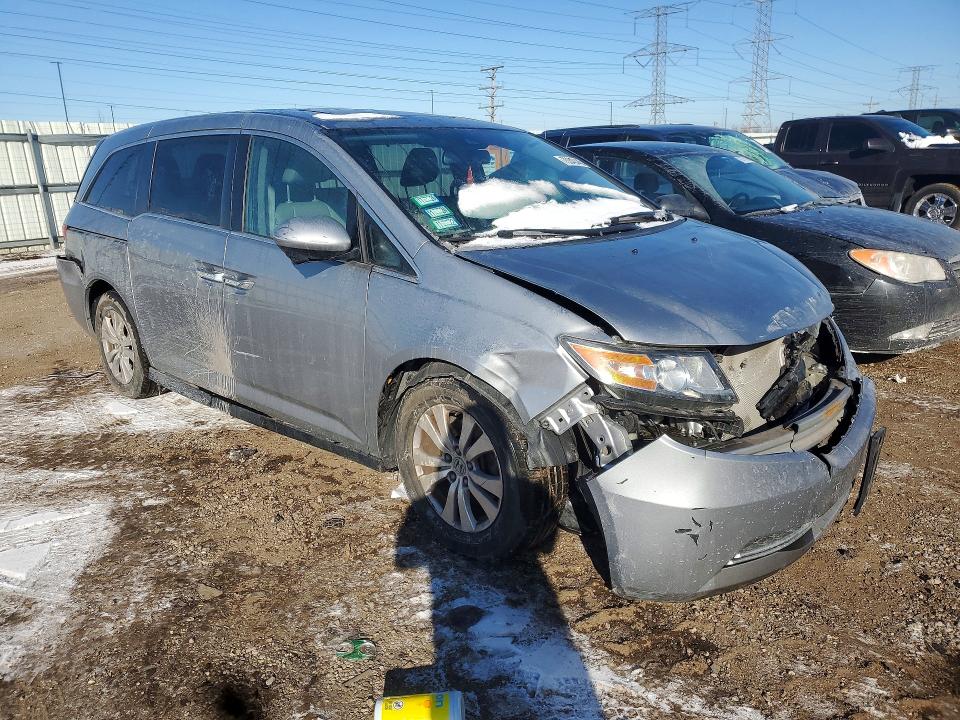Photo 4 from auction – 2016 HONDA ODYSSEY with VIN 5FNRL5H62GB150594