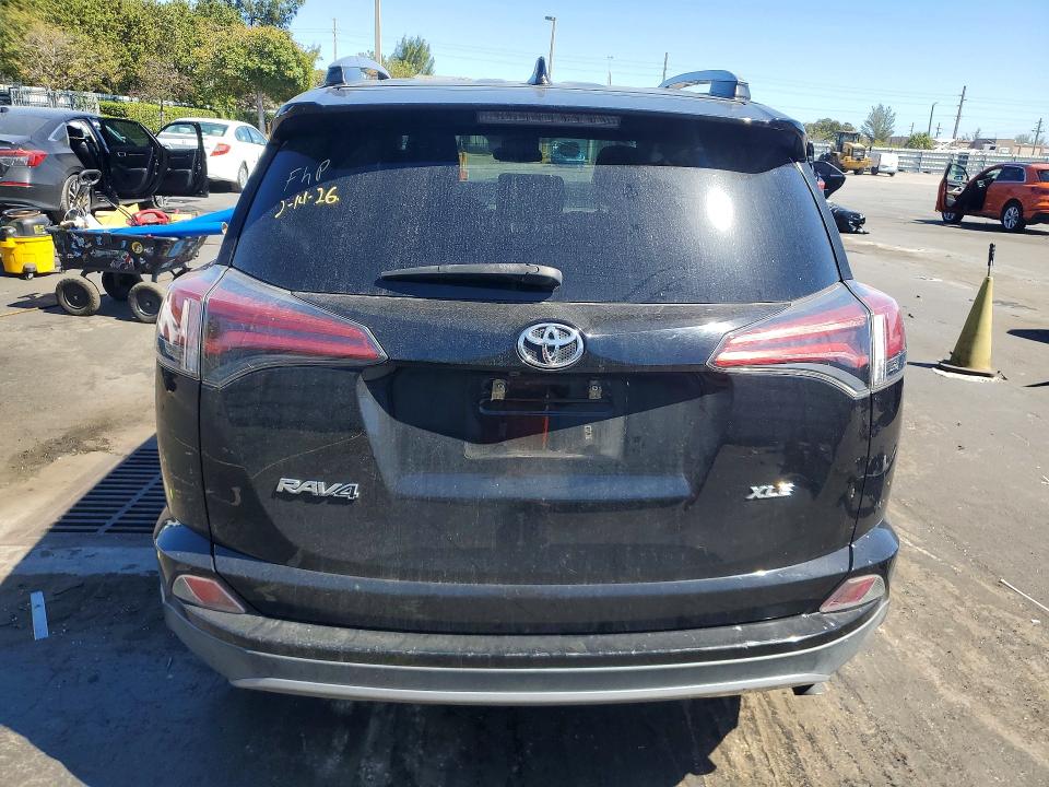 Photo 6 from auction – 2018 TOYOTA RAV4 with VIN 2T3WFREVXJW441133