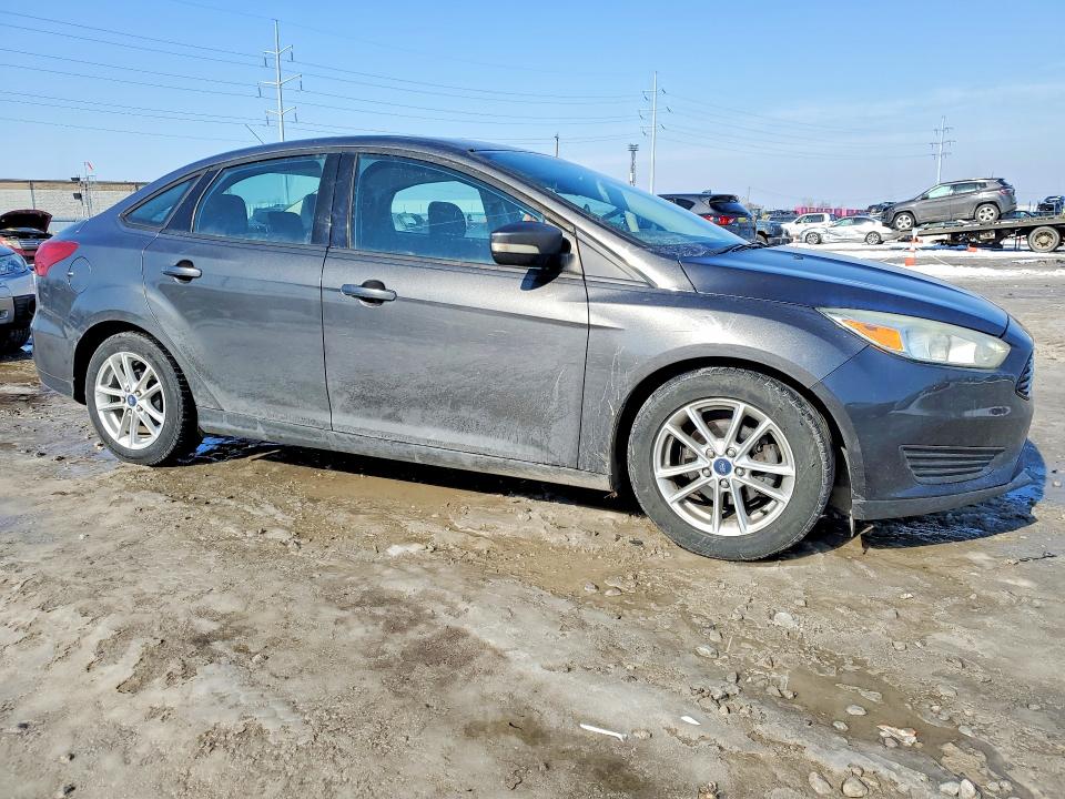 Photo 4 from auction – 2015 FORD FOCUS with VIN 1FADP3F23FL346998