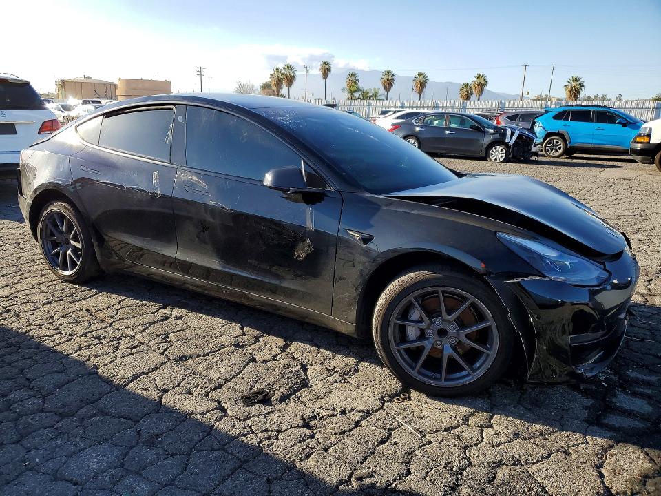 Photo 4 from auction – 2021 TESLA MODEL 3 with VIN 5YJ3E1EA3MF045396