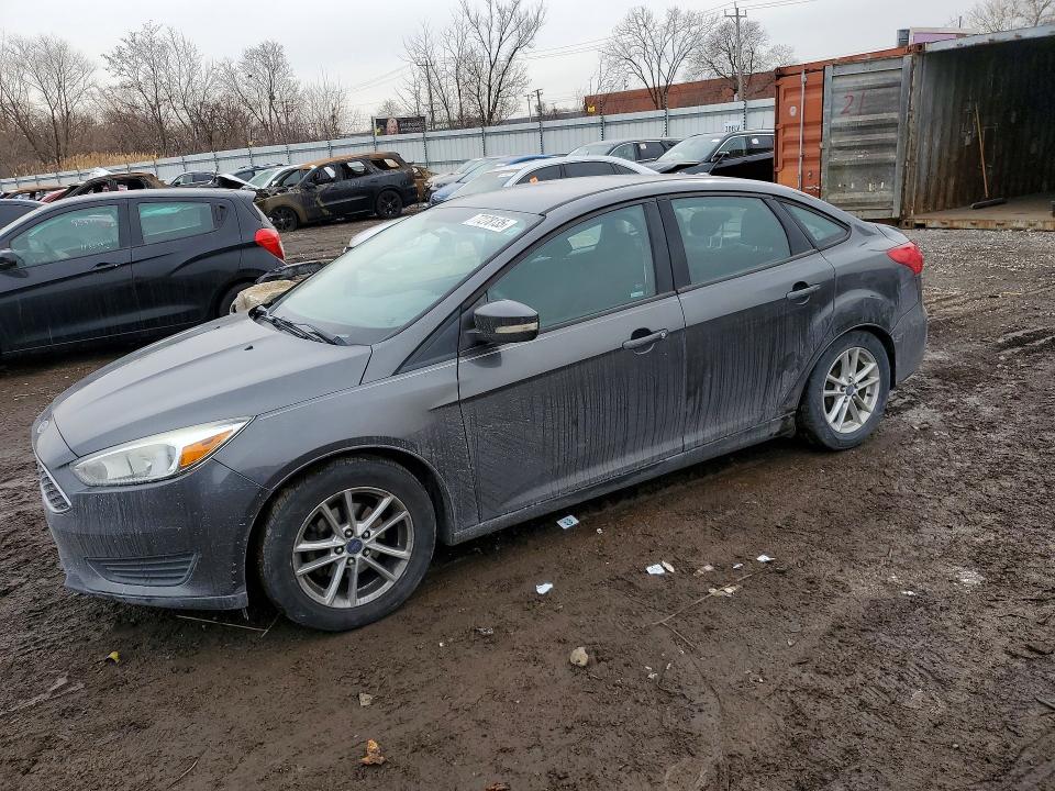 FORD FOCUS 2015 with VIN 1FADP3F23FL304976 - Photo from auction