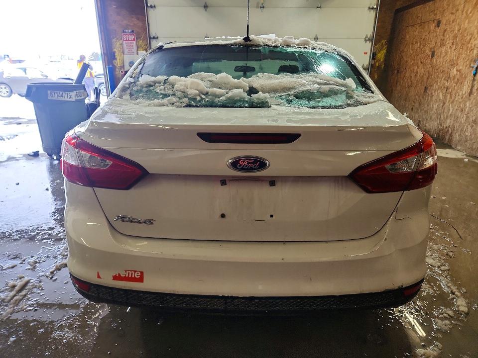 Photo 6 from auction – 2014 FORD FOCUS with VIN 1FADP3E22EL382973