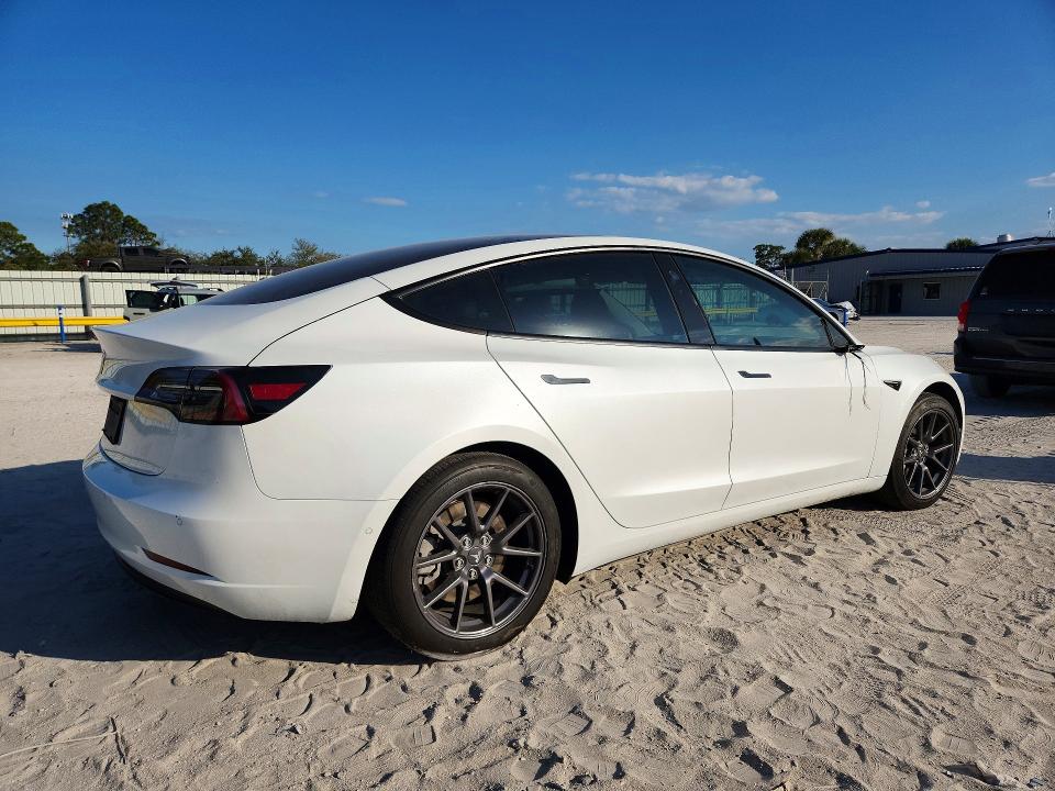 Photo 3 from auction – 2021 TESLA MODEL 3 with VIN 5YJ3E1EA8MF853632