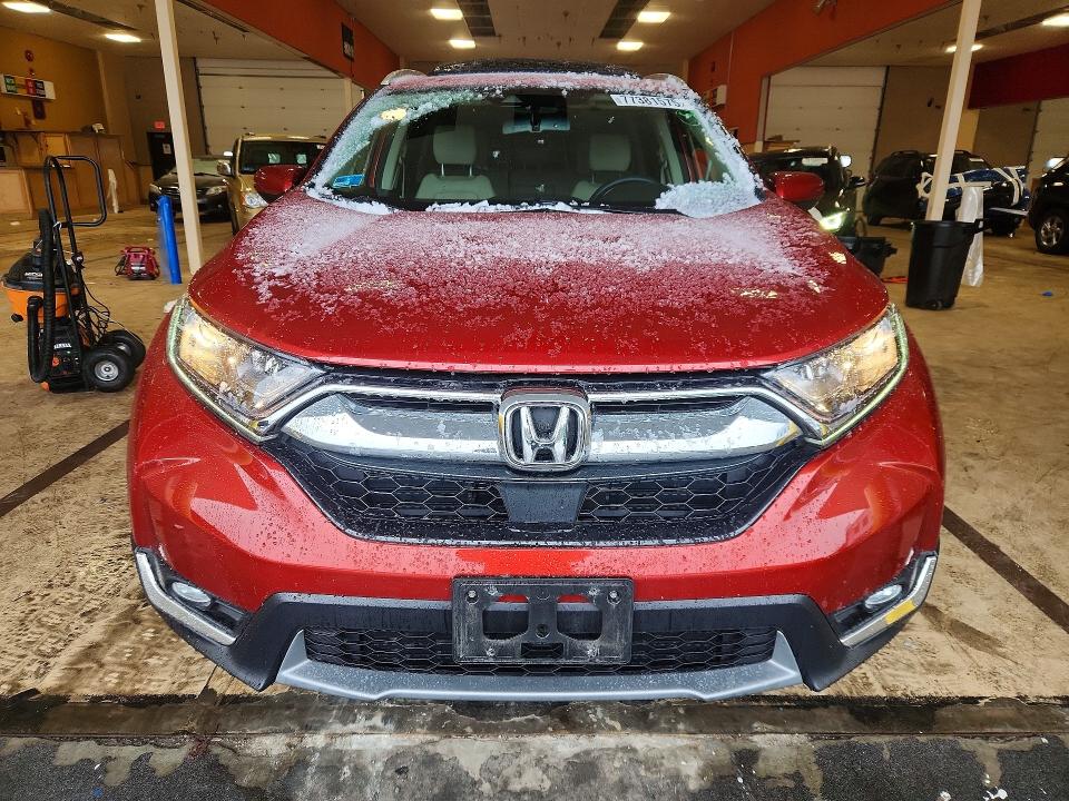 Photo 5 from auction – 2017 HONDA CR-V with VIN 5J6RW2H86HL032015