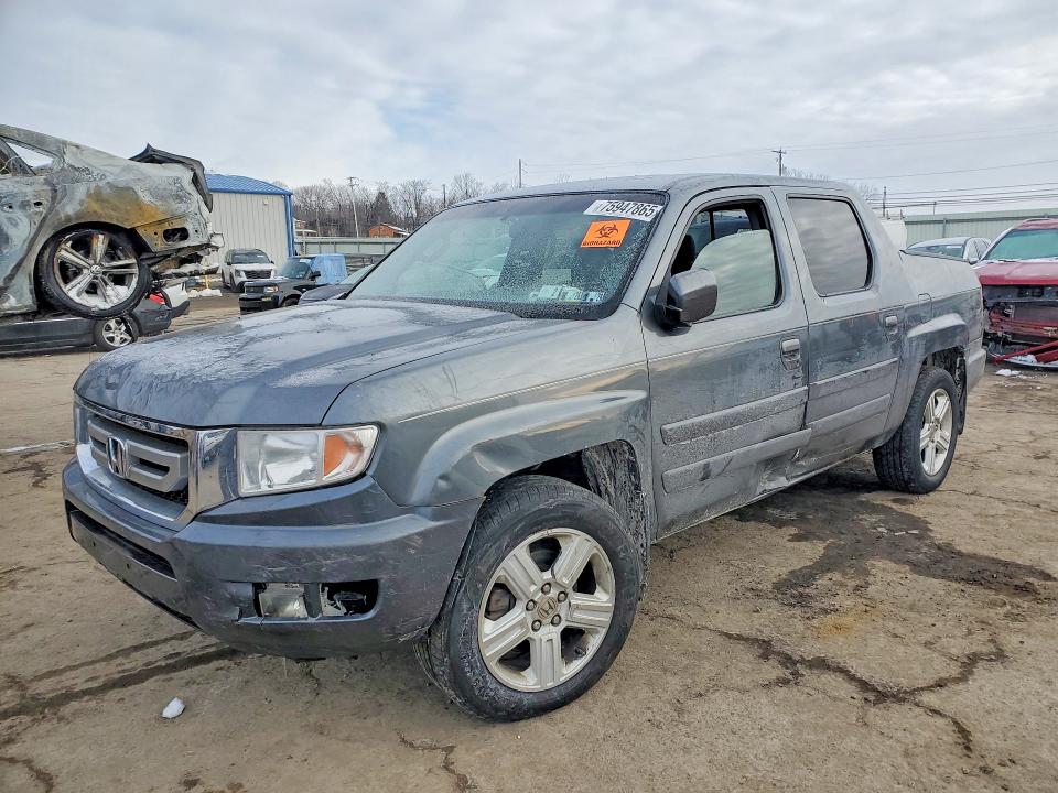 HONDA RIDGELINE 2011 with VIN 5FPYK1F53BB007784 - Photo from auction