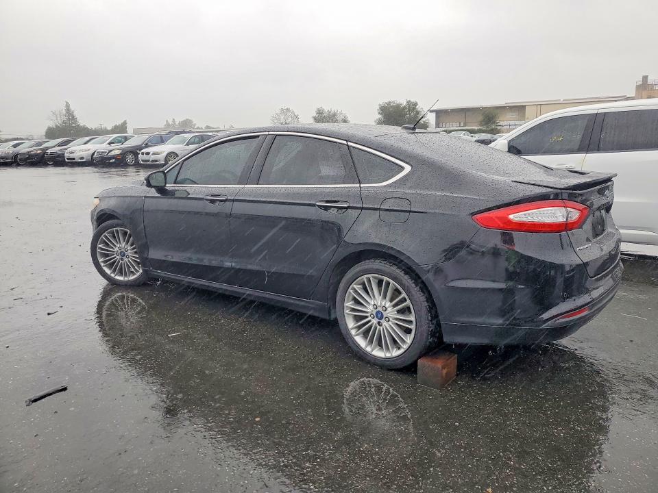 Photo 2 from auction – 2016 FORD FUSION with VIN 3FA6P0HD5GR187216