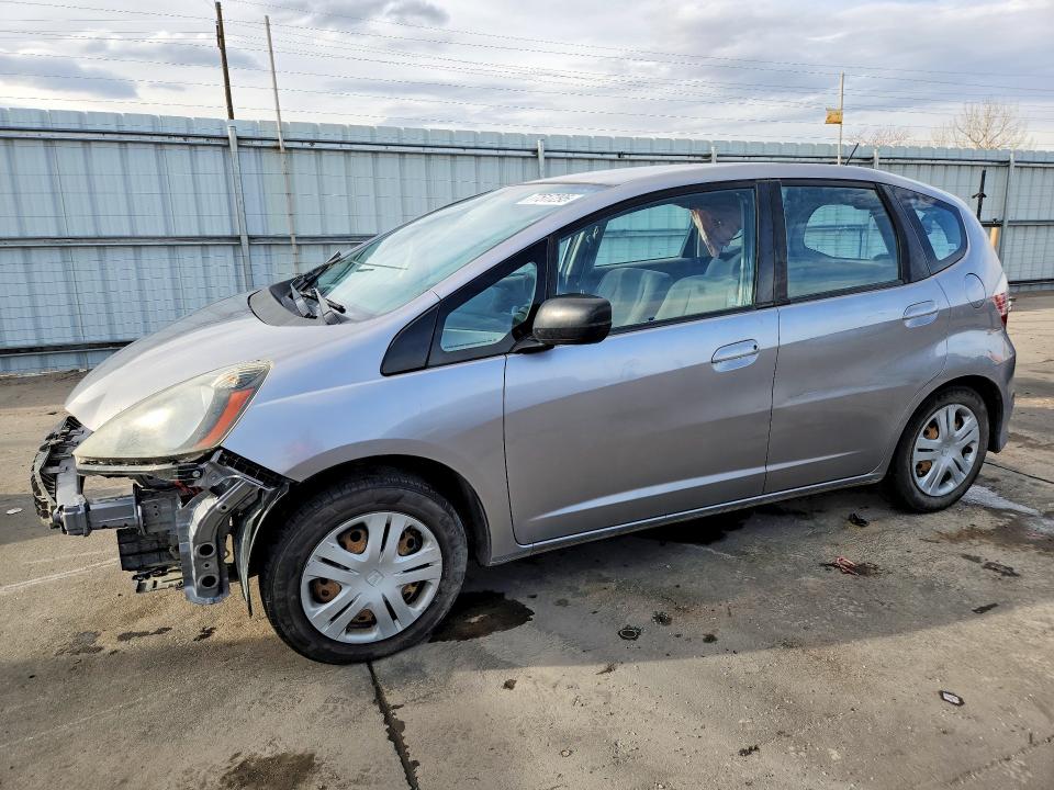 HONDA FIT 2009 with VIN JHMGE87279S038153 - Photo from auction