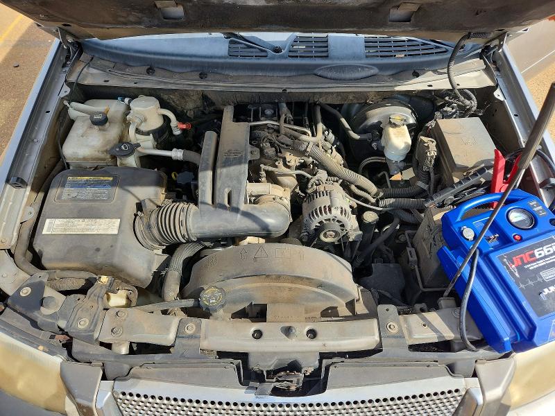 Photo 12 from auction – 2005 GMC ENVOY with VIN 1GKES63M852358061