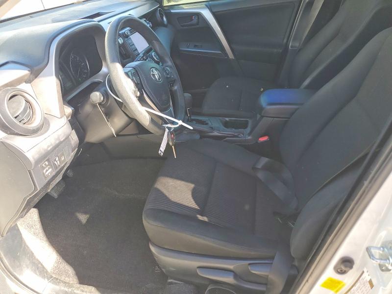 Photo 7 from auction – 2018 TOYOTA RAV4 with VIN JTMZFREV6JJ204067
