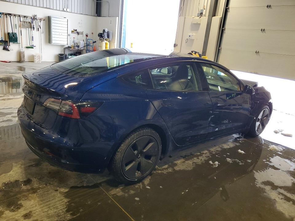 Photo 3 from auction – 2022 TESLA MODEL 3 with VIN 5YJ3E1EAXNF308906
