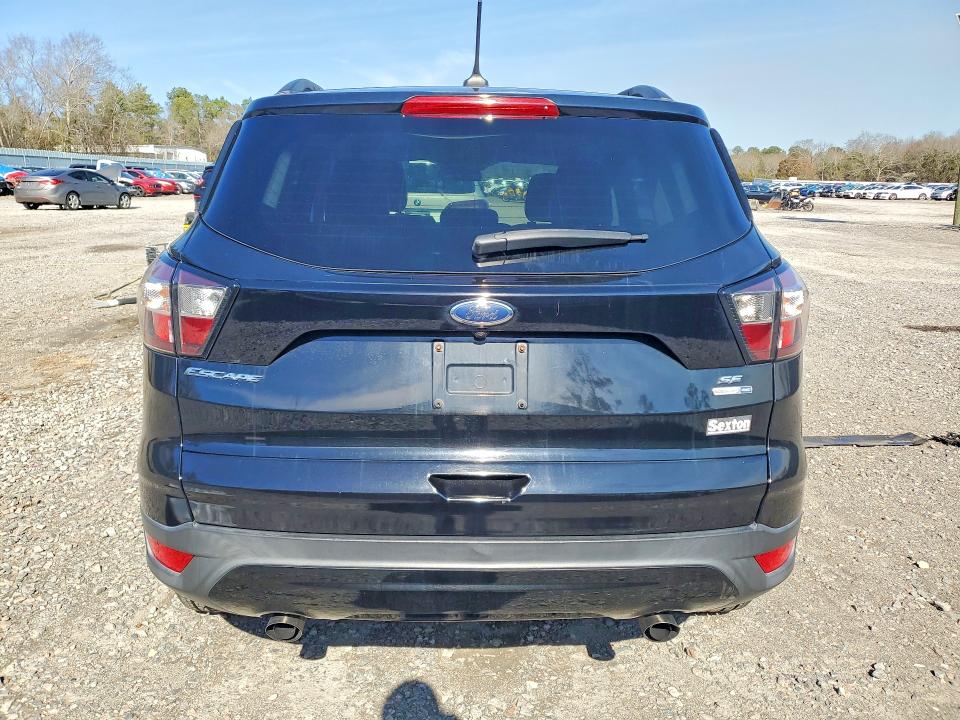 صورة رقم 6 من المزاد - 2018 FORD ESCAPE SE مع VIN 1FMCU9GD8JUA62363