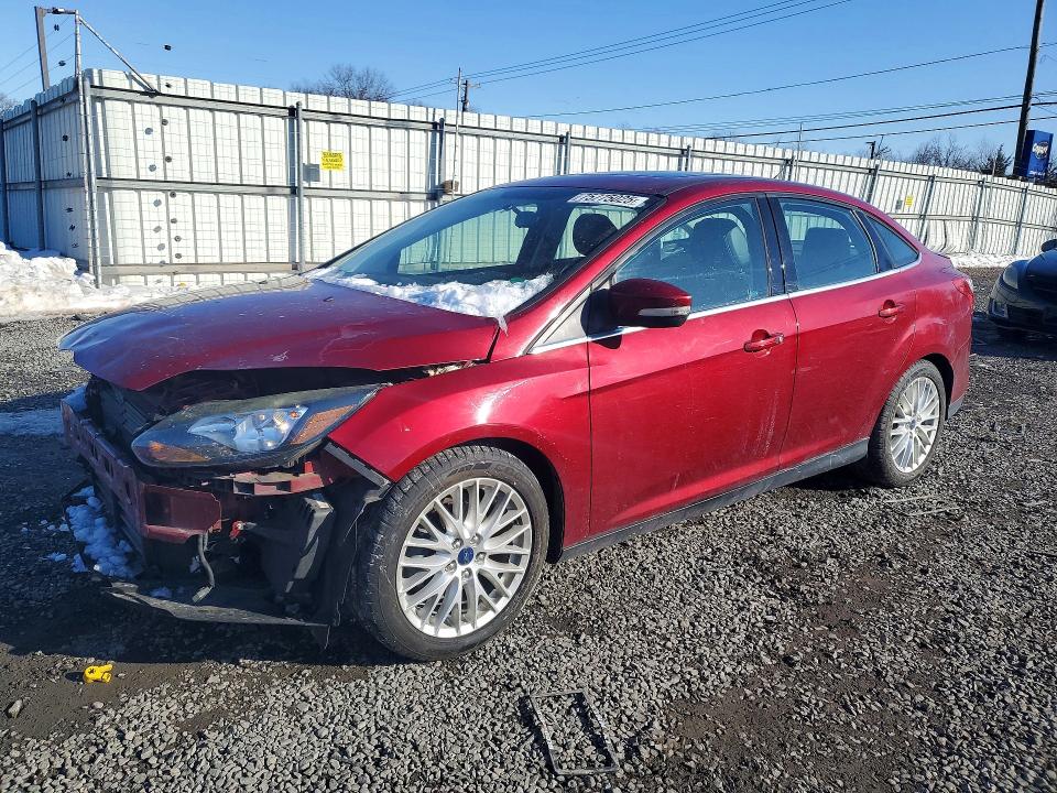 FORD FOCUS TITA 2014 with VIN 1FADP3J22EL446161 - Photo from auction