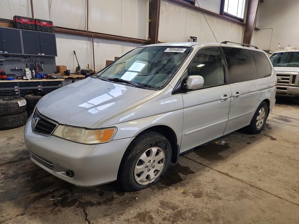 HONDA ODYSSEY 2003 with VIN 2HKRL18083H004460 - Photo from auction