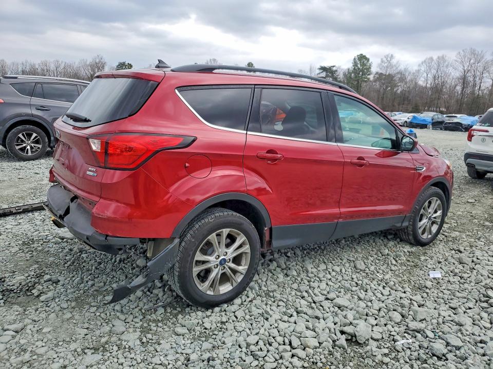 Photo 3 from auction – 2019 FORD ESCAPE with VIN 1FMCU9HD3KUB83995