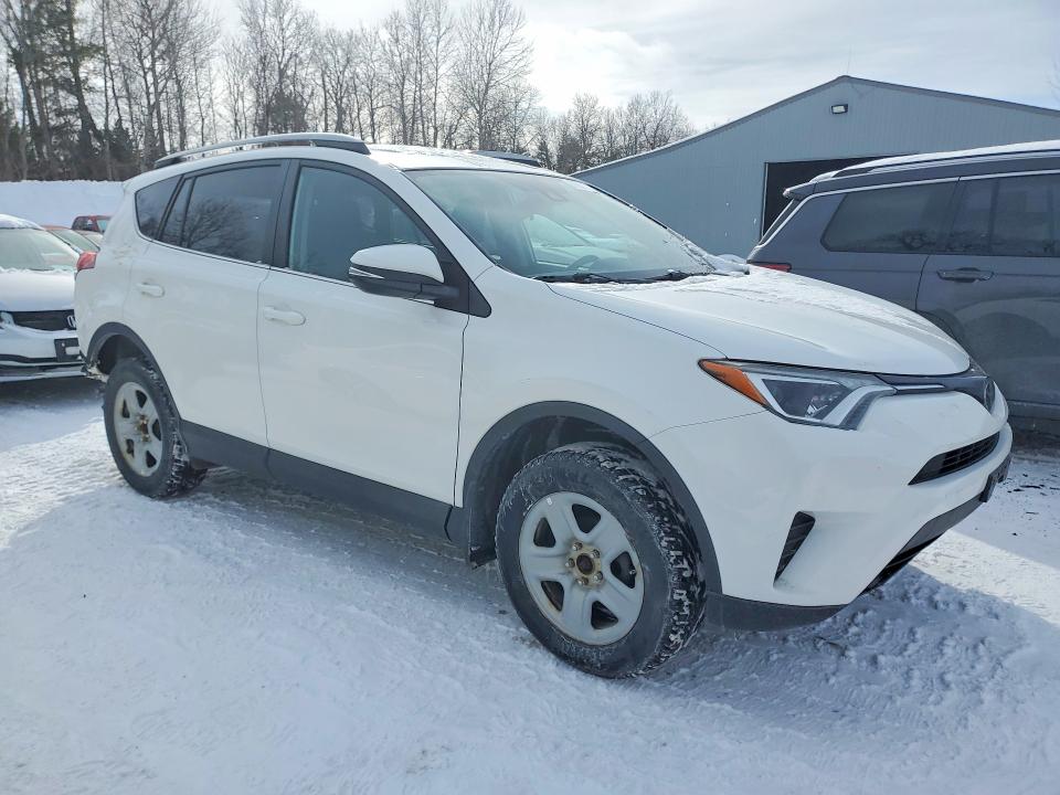 Photo 4 from auction – 2017 TOYOTA RAV4 LE with VIN 2T3ZFREV9HW385516
