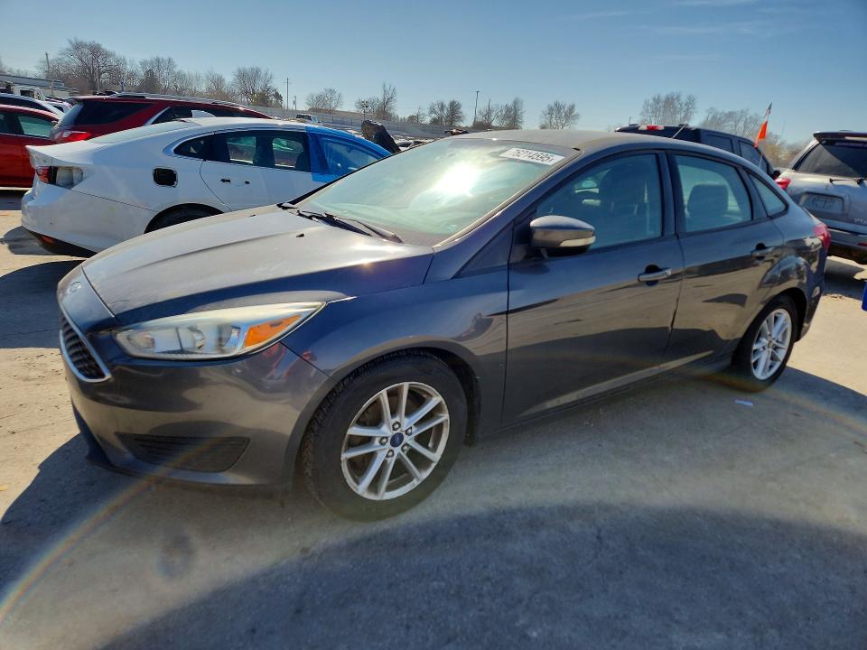 FORD FOCUS 2015 with VIN 1FADP3F27FL274266 - Photo from auction