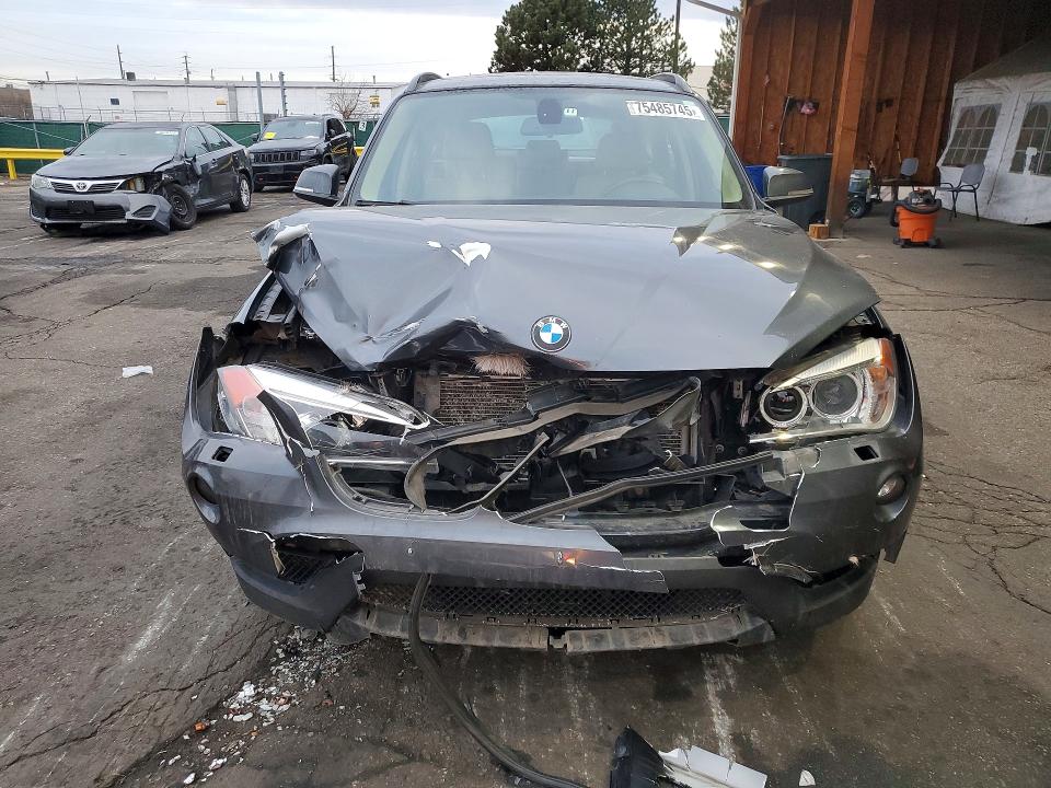 Photo 5 from auction – 2014 BMW X1 XDRIVE3 with VIN WBAVM5C52EVV91423
