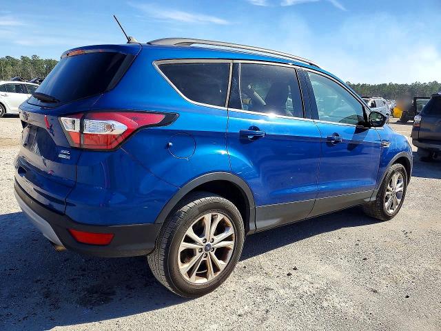 Photo 3 from auction – 2018 FORD ESCAPE with VIN 1FMCU9HD6JUA57869
