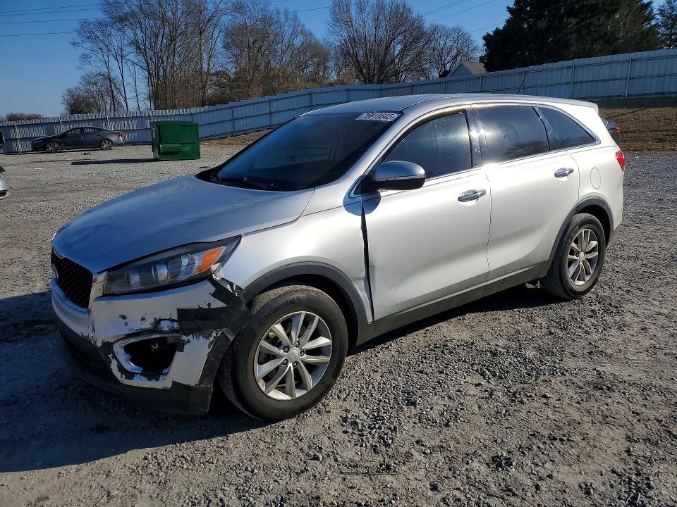 KIA SORENTO LX 2016 with VIN 5XYPG4A37GG041160 - Photo from auction
