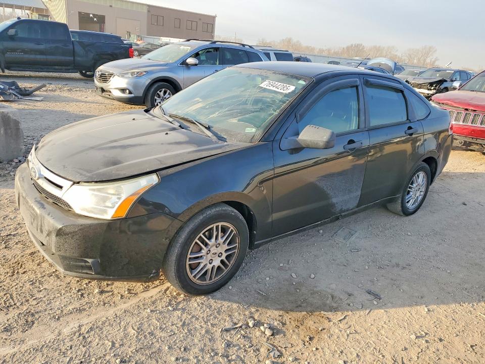 FORD FOCUS SE 2010 with VIN 1FAHP3FN9AW299060 - Photo from auction