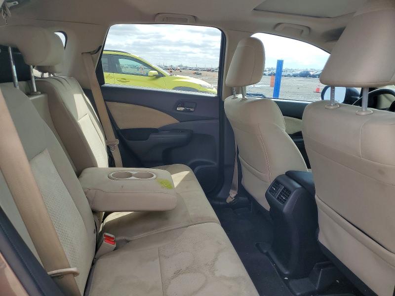 Photo 10 from auction – 2015 HONDA CR-V with VIN 3CZRM3H53FG704785