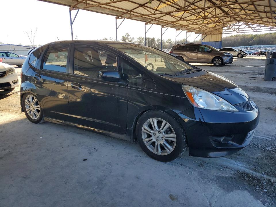 Photo 4 from auction – 2009 HONDA FIT with VIN JHMGE88689S022920