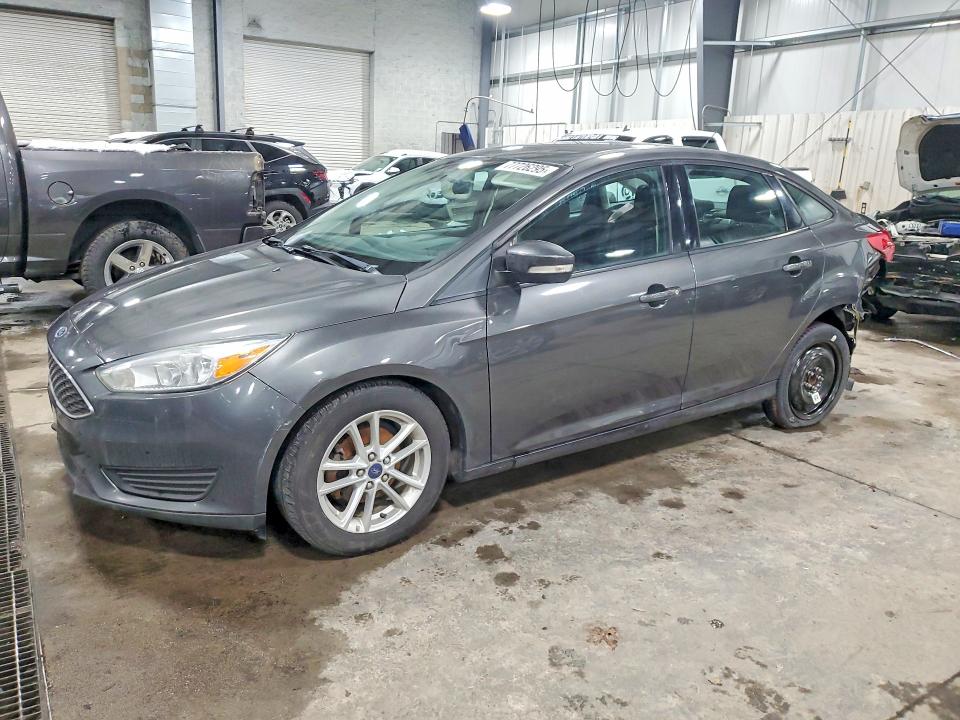FORD FOCUS SE 2016 with VIN 1FADP3F20GL303351 - Photo from auction